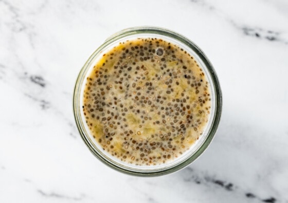 Banana chia pudding in a glass bowl.