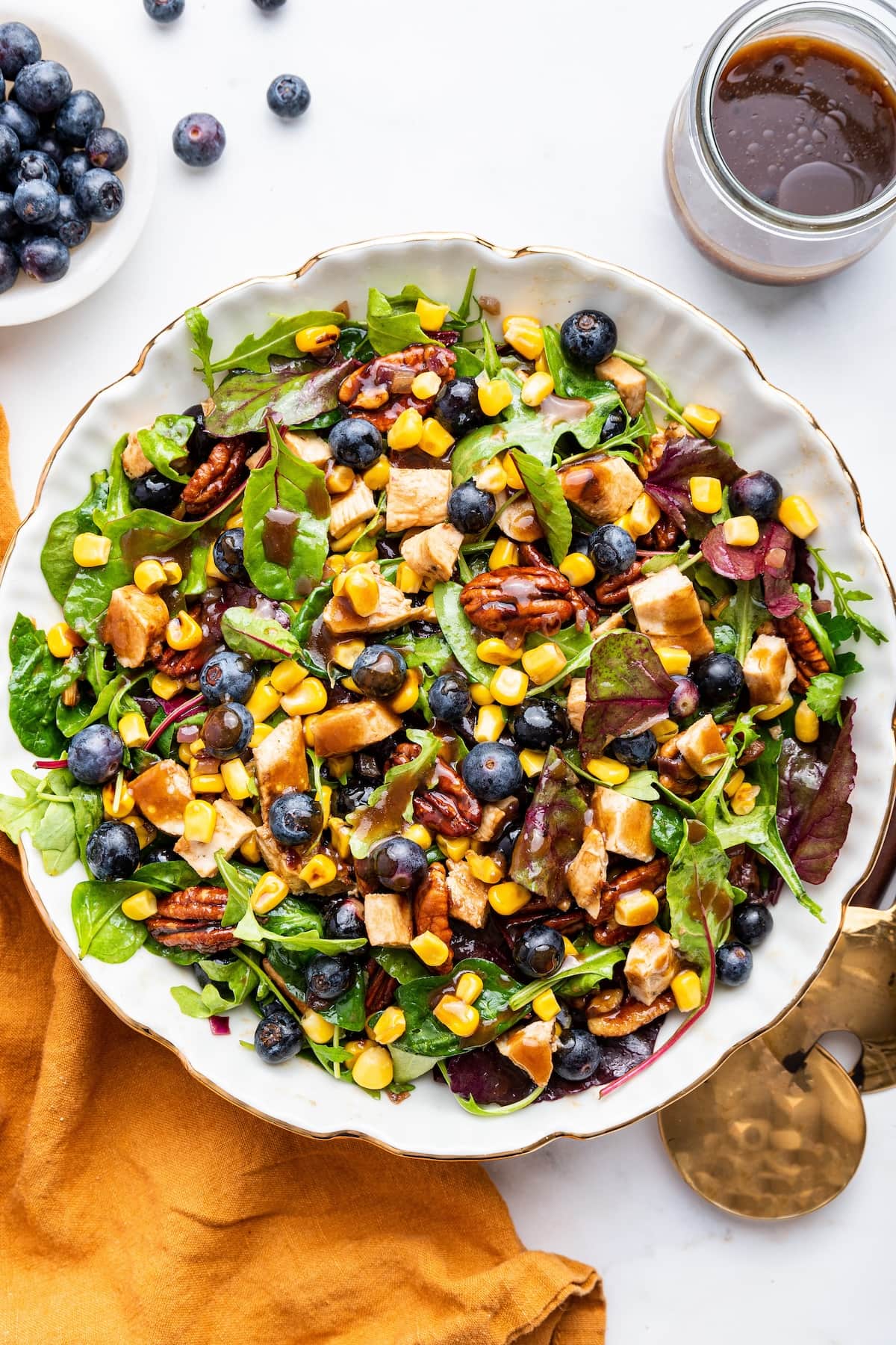 PIN THIS --> Blueberry Corn Chicken Salad Mixed blueberry corn chicken salad served with dressing.