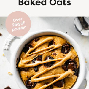 Air Fryer Baked Oats in a ramekin topped with chocolate and peanut butter.