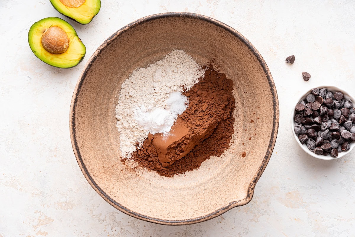 A large mixing bowl of flour, coco powder, and baking powder.