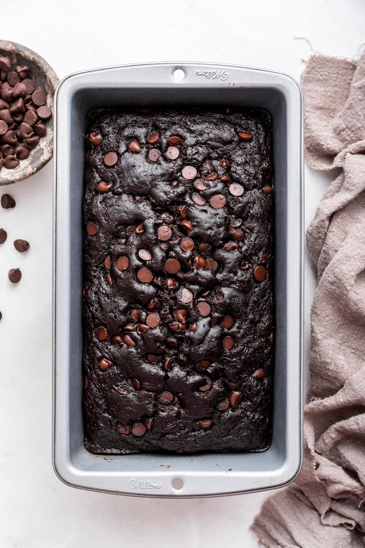 Chocolate zucchini bread in a bread pan.