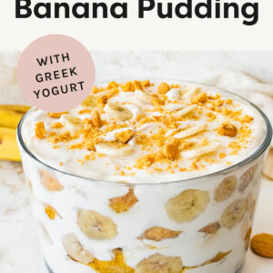 Trifle dish layered with bananas, vanilla wafers and pudding made from whipped topping and vanilla Greek yogurt.