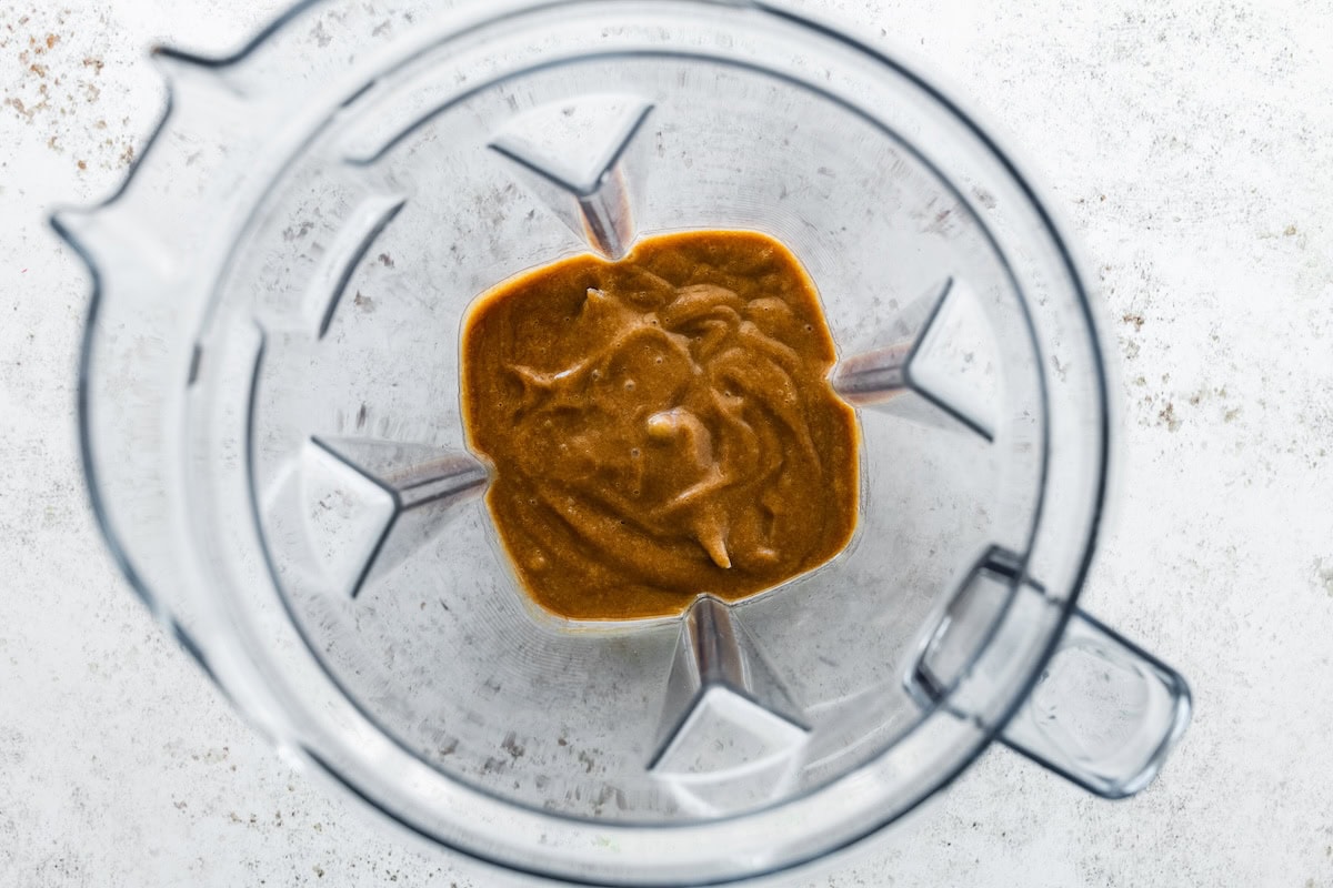 A date caramel in a blender after being blended.
