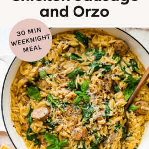 Skillet with a chicken sausage, spinach and orzo one pan dinner.