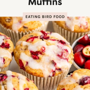 Cranberry orange muffins topped with a drizzle of icing.