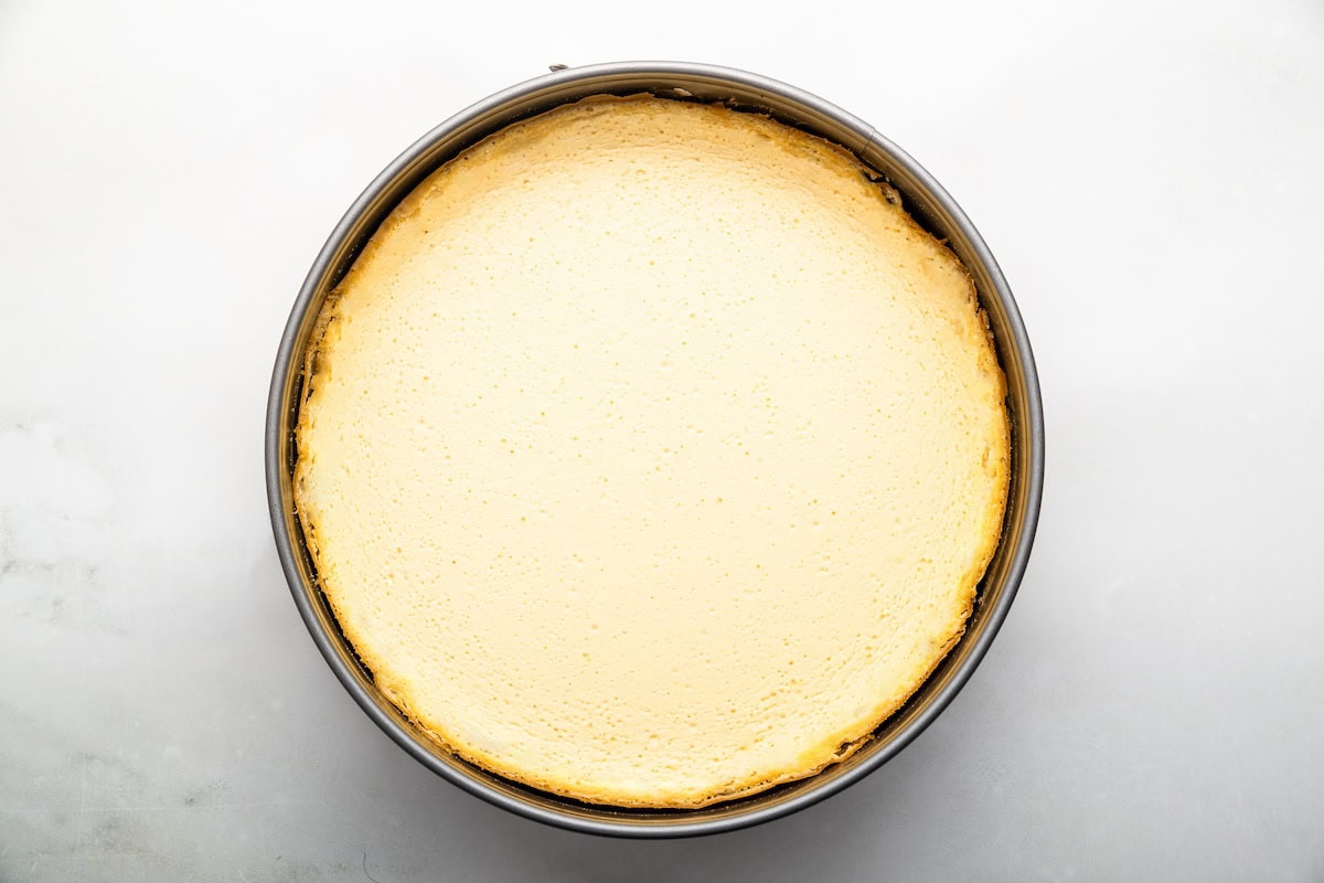 The baked healthy cheesecake in a springform pan before being sliced.