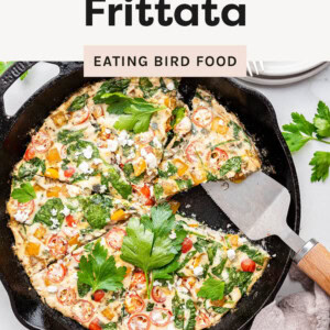 Egg White Frittata in a skillet with slices taken from it.