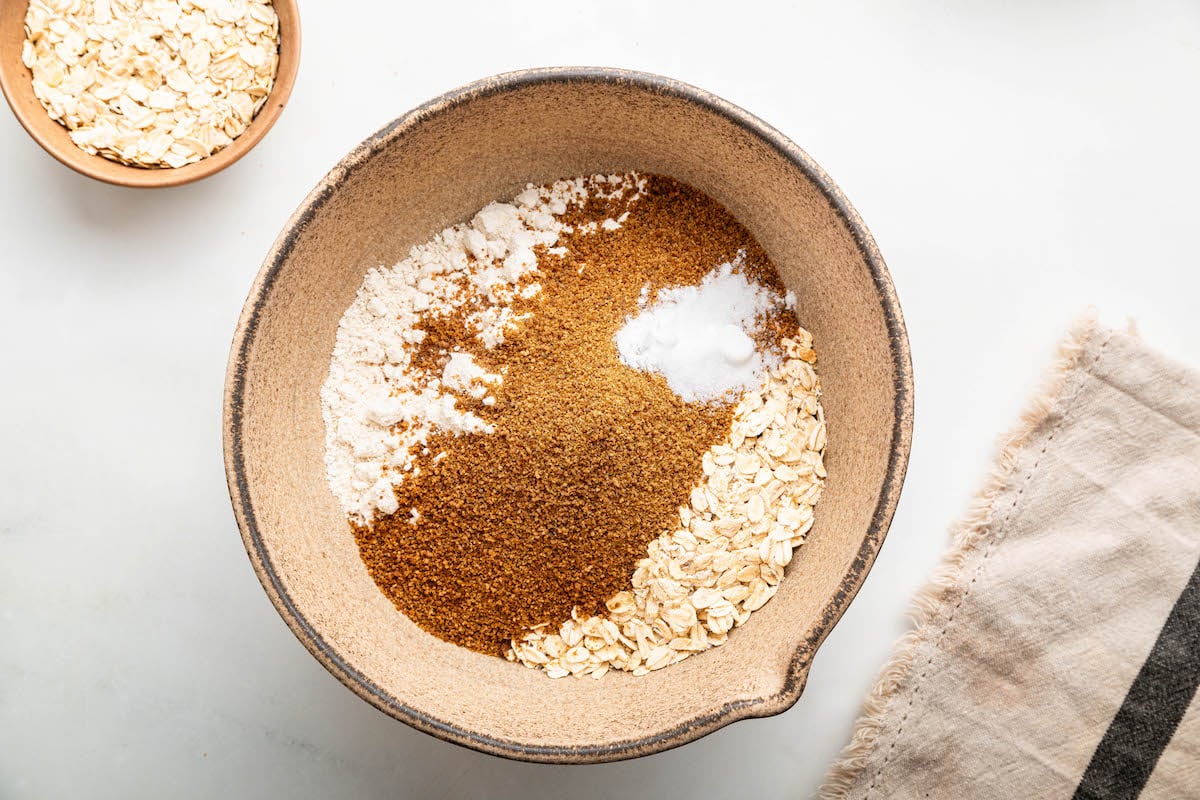 A large bowl of dry ingredients used for date bars.