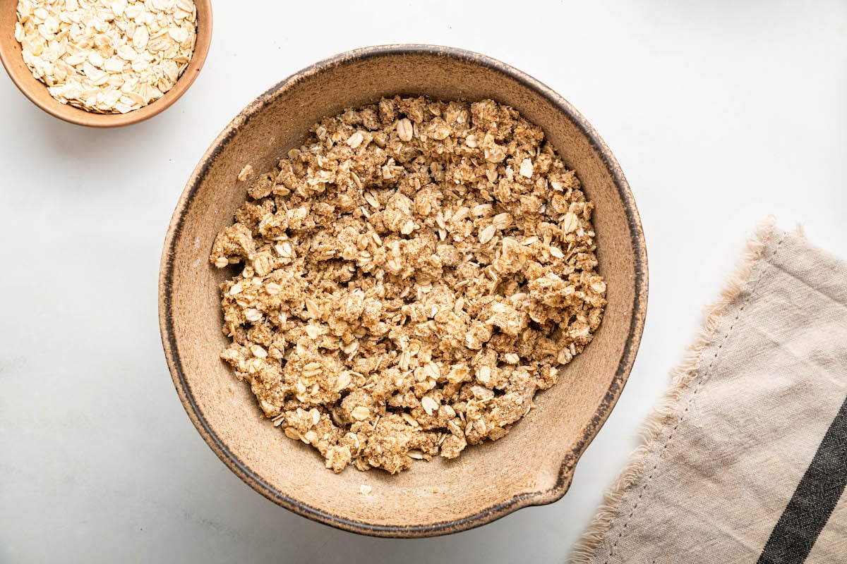 Oat crumble used for date bars in a large bowl.
