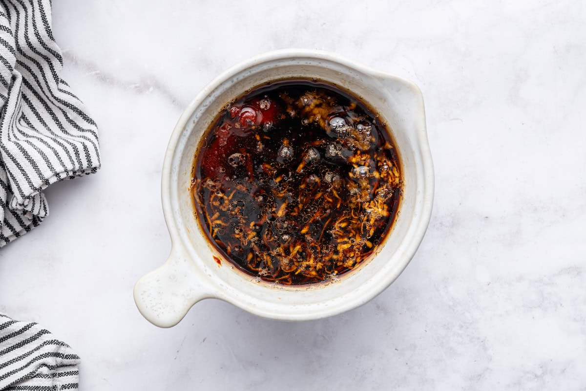 The sauce mixture for the korean beef bowl mixed together in a small mixing bowl.
