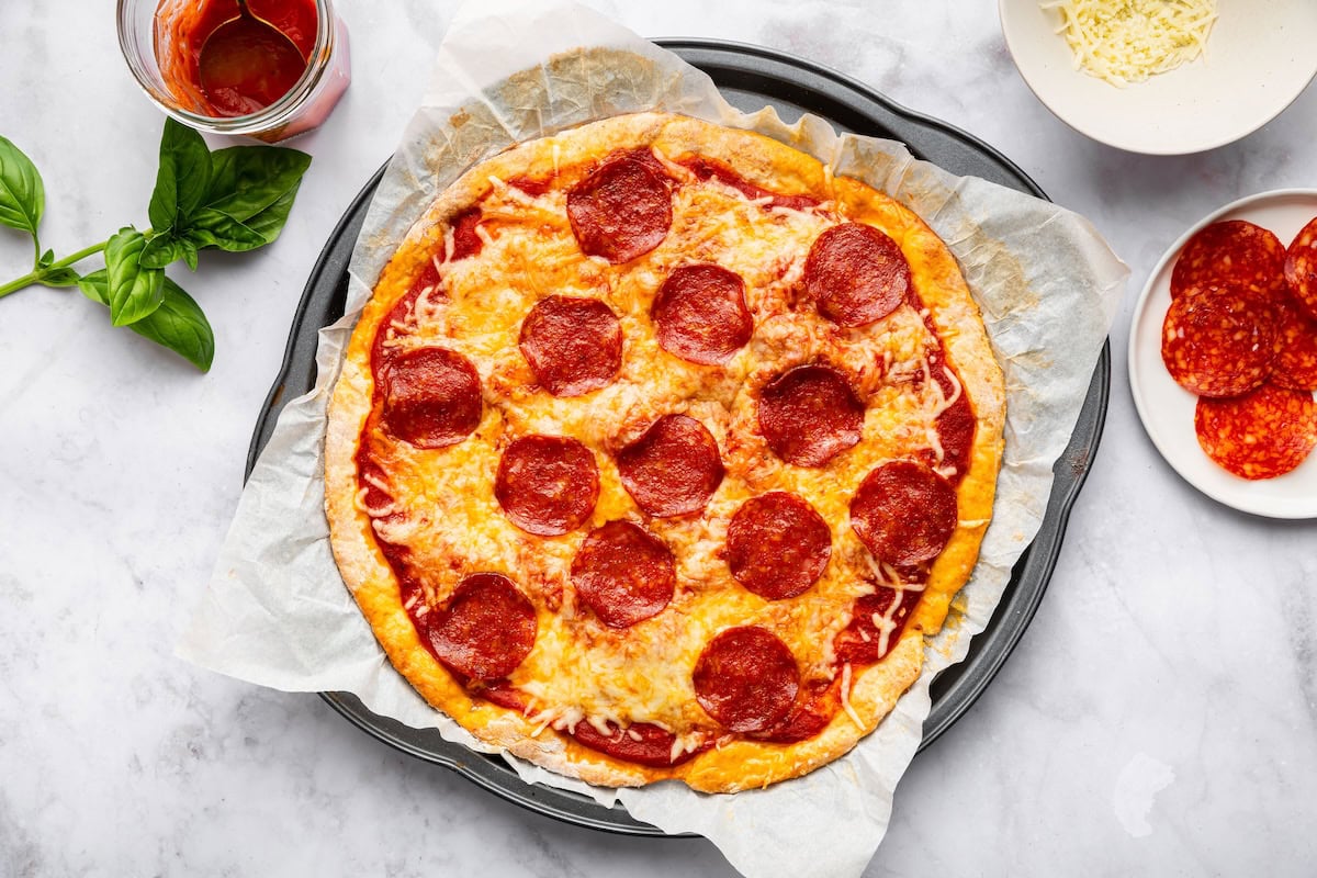 Whole pepperoni pizza on cottage cheese crust baked until golden.