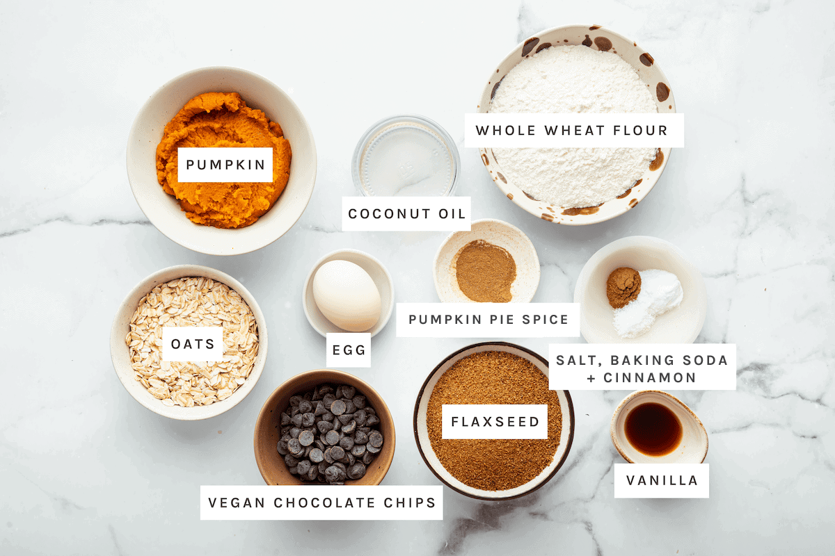 Pumpkin, coconut oil, whole wheat flour, oats, egg, cinnamon, salt, baking soda, pumpkin pie spice, flaxseed, vegan chocolate chips, vanilla
