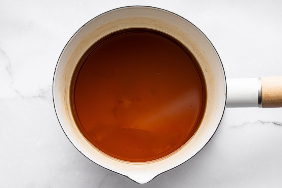 brewed espresso Top view of freshly brewed espresso with a rich caramel color in a small bowl.
