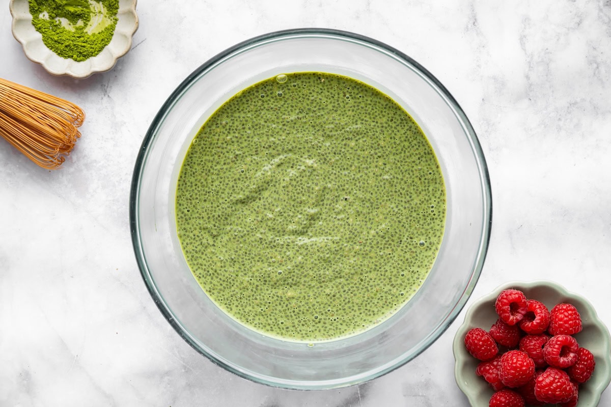 Creamy matcha chia pudding Creamy matcha chia pudding in a glass bowl after soaking for a few hours.
