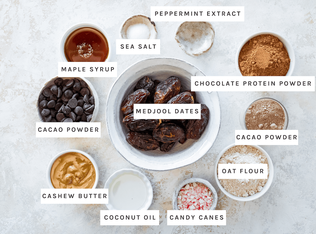 Chocolate Peppermint Protein Balls ingredients Maple syrup, sea salt, peppermint extract, chocolate protein powder, cacao powder, oat flour, candy canes, coconut oil, cashew butter, chocolate chips, Medjool dates