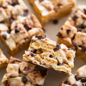 High protein s'mores treats near one another on parchment paper.