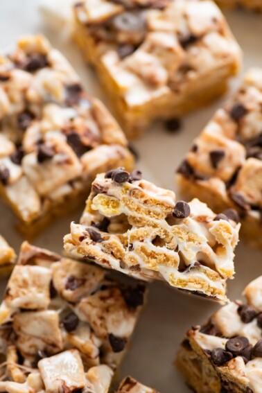 High protein s'mores treats near one another on parchment paper.