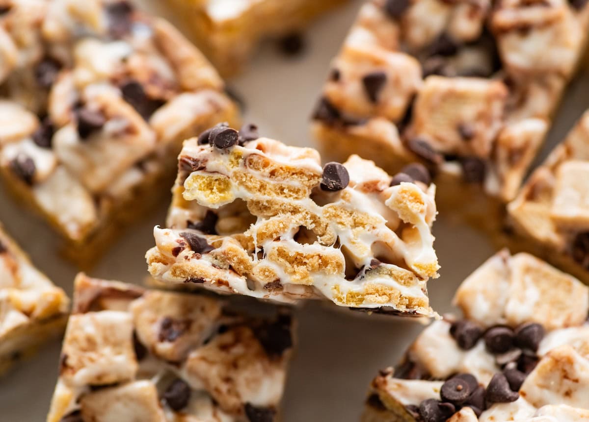 High protein s'mores treats near one another on parchment paper.
