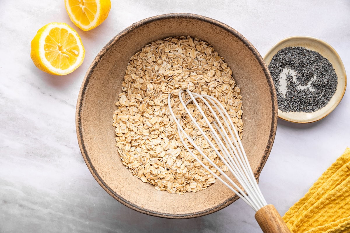 Rolled oats and dry ingredients whisked together for baked oatmeal base.