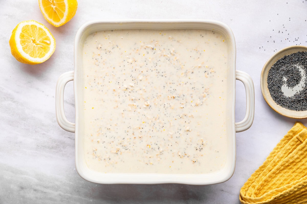 Unbaked lemon poppy seed oatmeal mixture in baking dish before baking.
