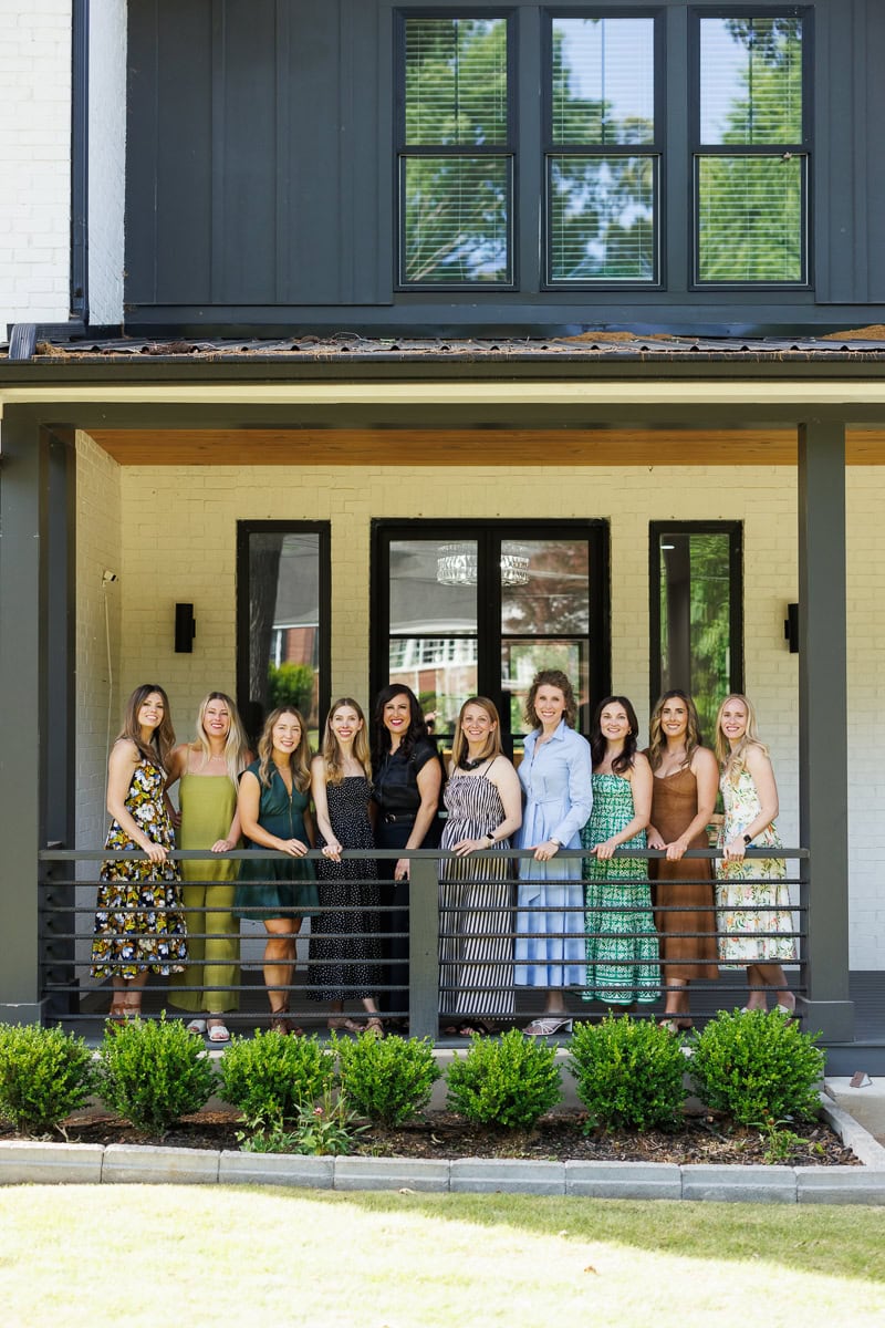 A group of food bloggers posing outside during a Fresh Air Retreat in Atlanta.