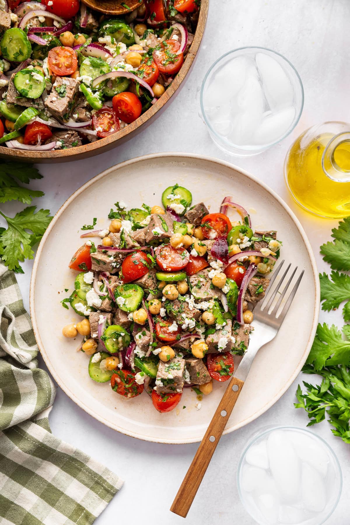 A serving of chimichurri steak salad on a plate.