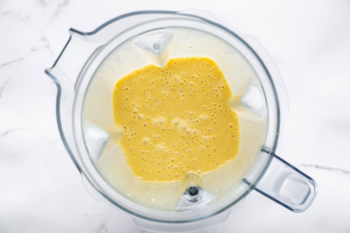 Honey mustard dressing in a blender.