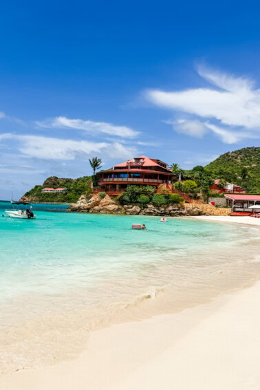 Eden Rock hotel perched on volcanic rock at St. Jean Beach, St. Barths, with crystal clear turquoise water