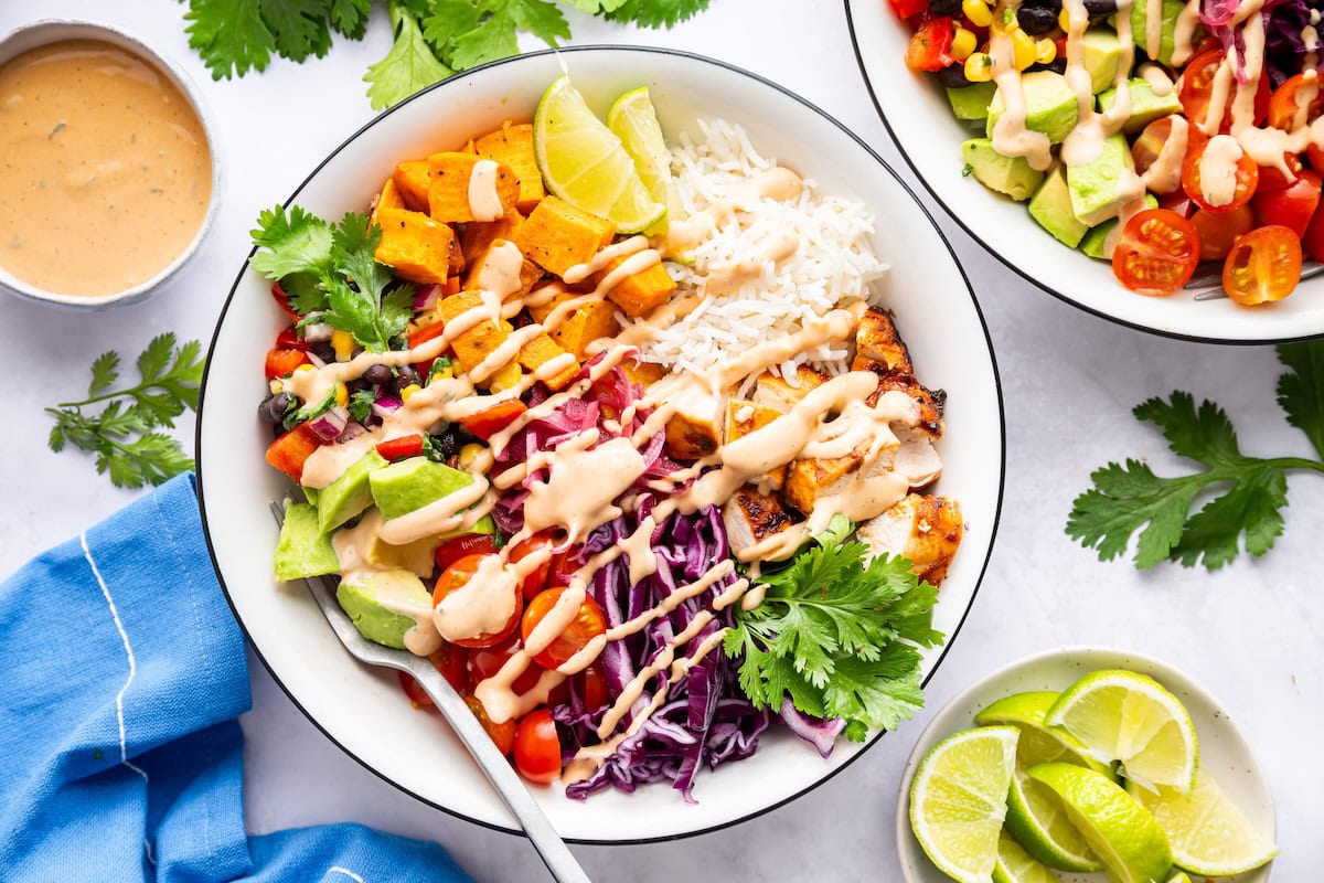 BBQ Chicken bowls served with a drizzle of BBQ ranch dressing.